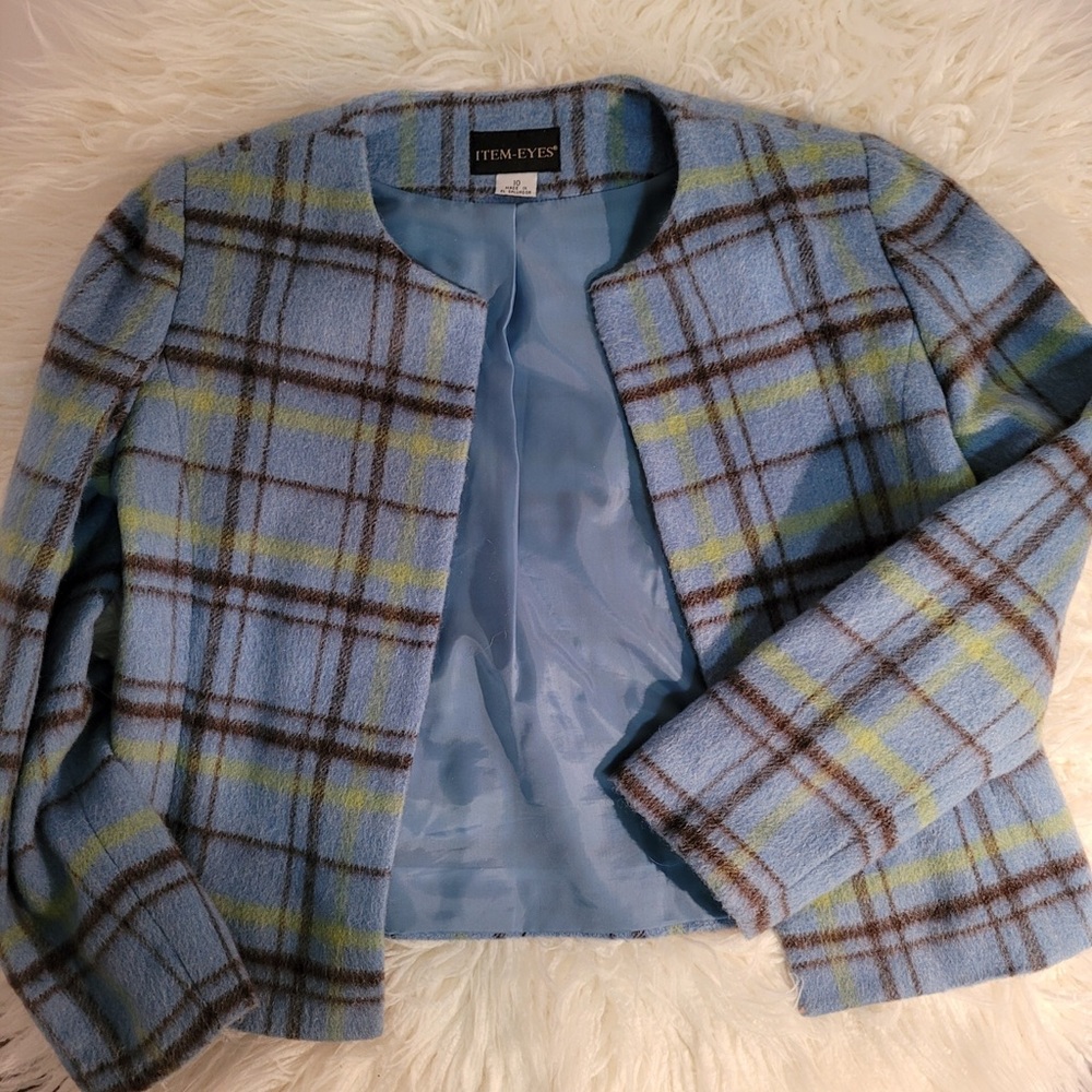 blue, green, and brown coat